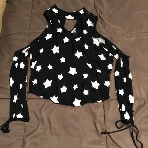 Adorable shirt with white stars on it
